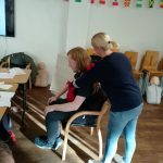 2 team members side-on in-action first aid shot.